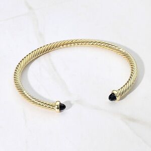 Twisted gold cable cuff bracelet w/black cabochons